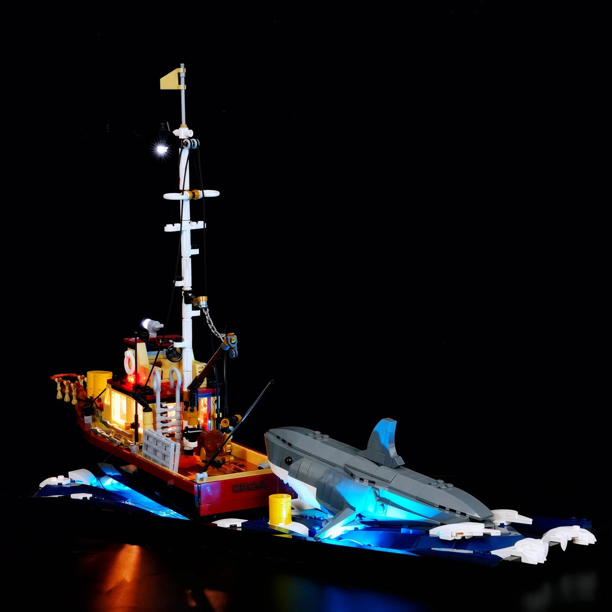 bateau pêche lego rouge blanc bleu détails métalliques hublots cordages