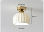 lampe moderne acrylique verre céramique blanc doré rayures horizontales minimaliste