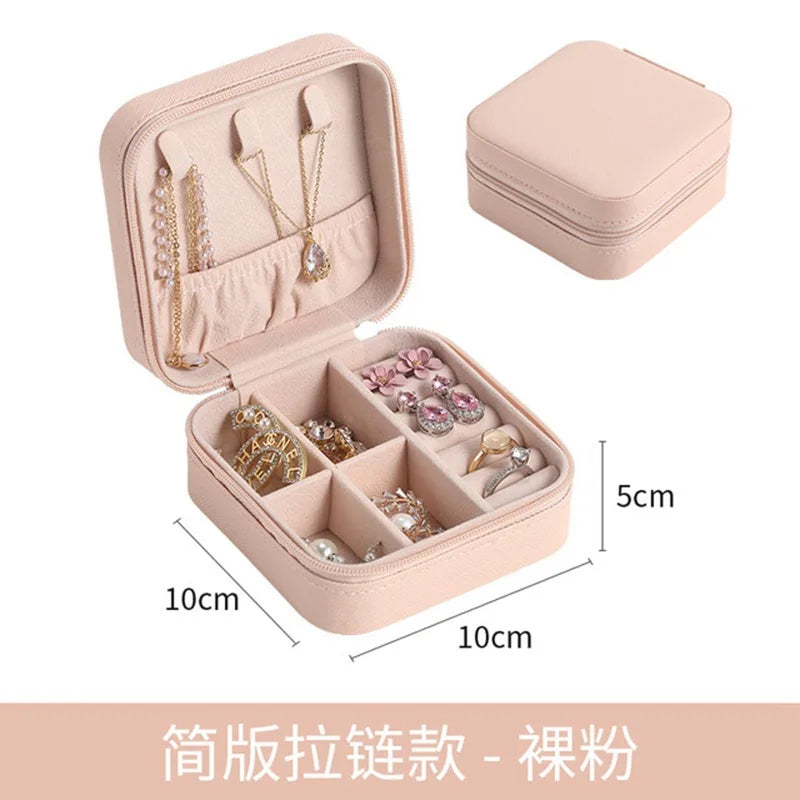 boîte rangement bijoux simili cuir vert clair rose pâle noir moderne pratique fermeture glissière