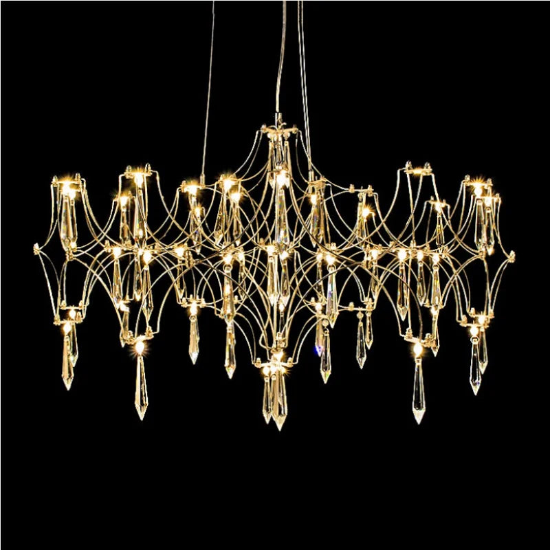 lustre moderne or cristaux transparents branches stylisées salon chambre principale