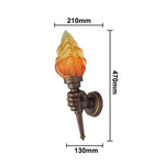 applique murale torche bronze flamme translucide texture rugueuse antique industrielle fixée mur