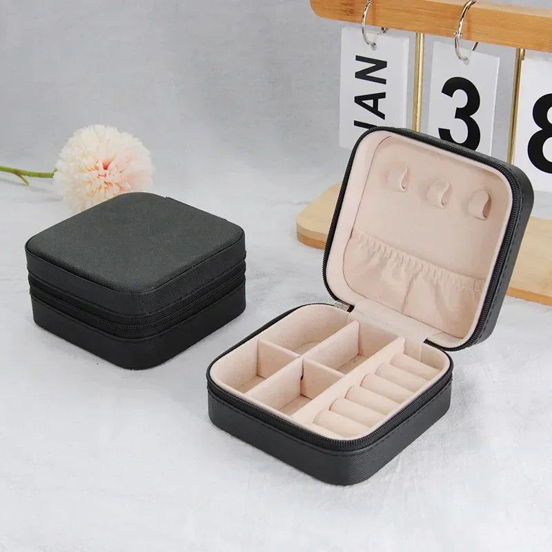 boîte bijoux portable cuir velours moderne fermeture glissière rangement colliers boucles doreilles bagues bracelets