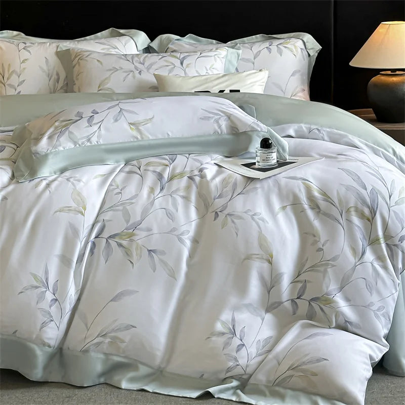 ensemble literie quatre pièces housse couette drap taies fleurs motifs élégants tissu lyocell