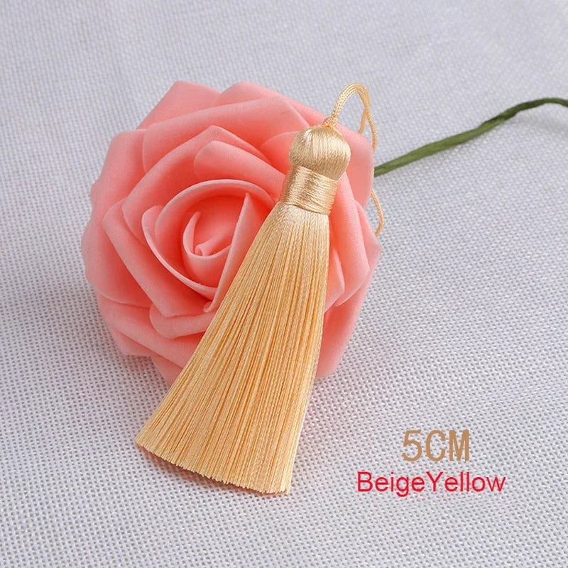 pompons polyester couleur variée 5cm longueur 18cm décoration artisanale rideaux couture pièces