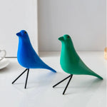 décor oiseau bois peint jaune noir rouge bleu blanc vert pieds métalliques moderne salon