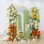 arche fleurs mariage deco exterieur blanc orange vert classique festif
