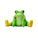 statue grenouille verte jaune bottes assise mains jointes aspect céramique décoratif animalier enfantinextérieur patio