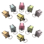 porte clés miniature transparent motif géométrique noir vert clair rose pâle doré décoration ornement