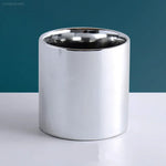 cache pot céramique finition or moderne plante verte décoration intérieure brillance lisse minimaliste maison