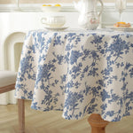 nappe ronde fleur bleue motif floral rustique franges table beige