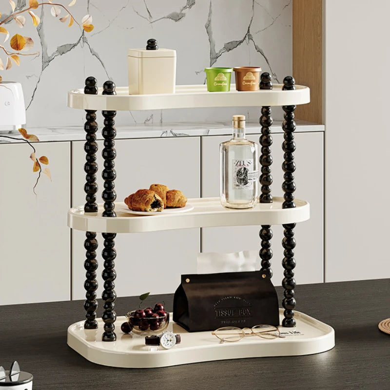 étagère trois niveaux moderne minimaliste blanc noir cosmétiques parfums tasses blancs