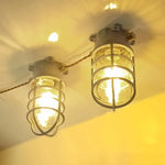 lampe murale industrielle vintage bronze noir gris ampoule e27 verre translucide grille métallique fixée