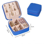 boîte rangement bijoux simili cuir vert clair rose pâle noir moderne pratique fermeture glissière