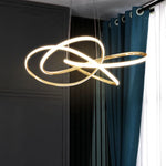 suspension lumineuse contemporaine or blanc géométrique minimaliste spirale chaînes suspendues