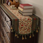 tableau decoratif lin motifs floraux pompons multicolores table buffet ethnique rustique