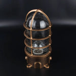 Lampe sécurité industrielle vintage fonte noire bronze bleu clair verre transparent grille métallique