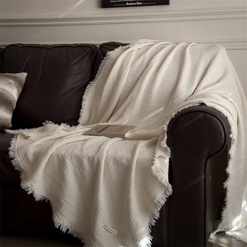 couverture coton tricot épais pompon beige clair motif géométrique canapé maison voyage décoratif