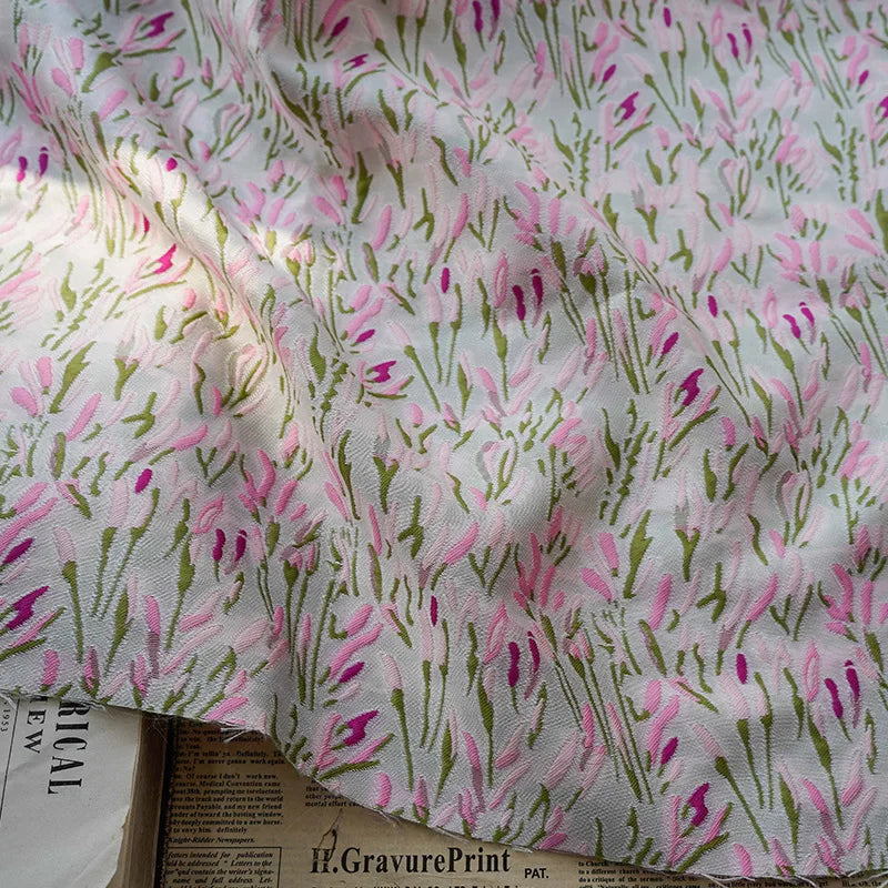 tissu polyester fleurs stylisées rose blanc imprimé protection uv largeur 150cm texture rugueuse occasionnels