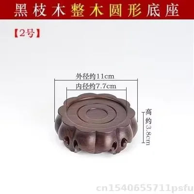 support décoration bois marron foncé texture naturelle gravure circulaire classique artisanal théière vase boule