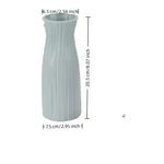 vases decoratifs modernes minimalistes rose bleu vert blanc lignes verticales texturées fleurs artificielles
