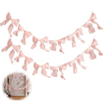 décoration festive guirlande nœuds rose tissu texturé semi transparent mariage anniversaire enfant baby shower
