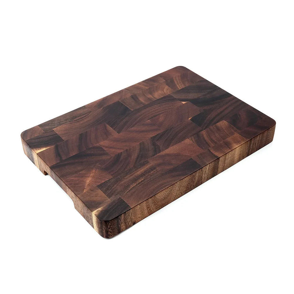 planches découpe bois noyer marron foncé moderne couteau carotte ail romarin poivre chou