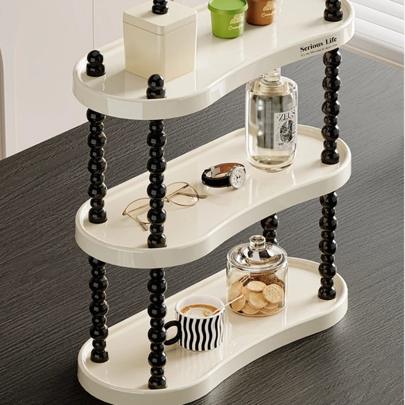 étagère trois niveaux moderne minimaliste blanc noir cosmétiques parfums tasses blancs