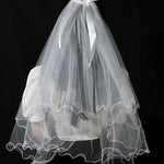 voile mariée tulle plissé blanc classique romantique fixé noeud transparent élégant