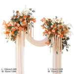 arche décorative boho chic fleurs artificielles orange feuilles vertes franges blanches extérieur mariage anniversaireévénement