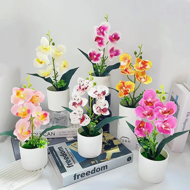 décoration intérieure orchidées artificielles pots blancs fleurs simples feuilles vertes moderne