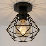 lampe industrielle fer forgé grille géométrique noire éclairage intérieur salon restaurant