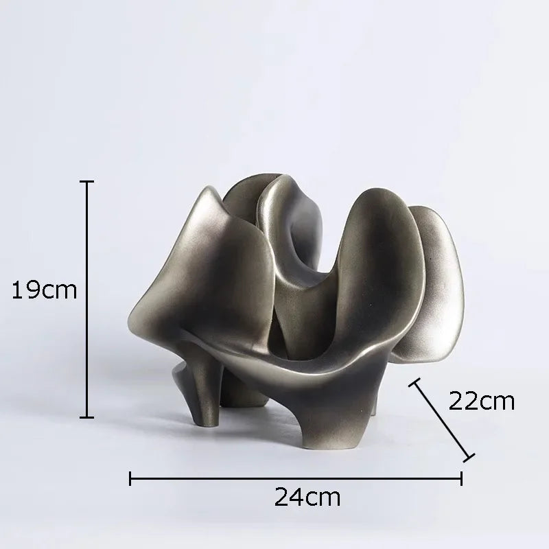 décoration moderne sculpture abstraite résine gris foncé bronze formes organiques surface lisse