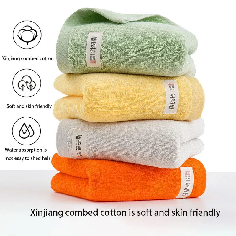 serviettes bain coton douces absorber vert clair jaune gris orange blanc texture duveteuse moderne