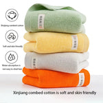 serviettes bain coton douces absorber vert clair jaune gris orange blanc texture duveteuse moderne