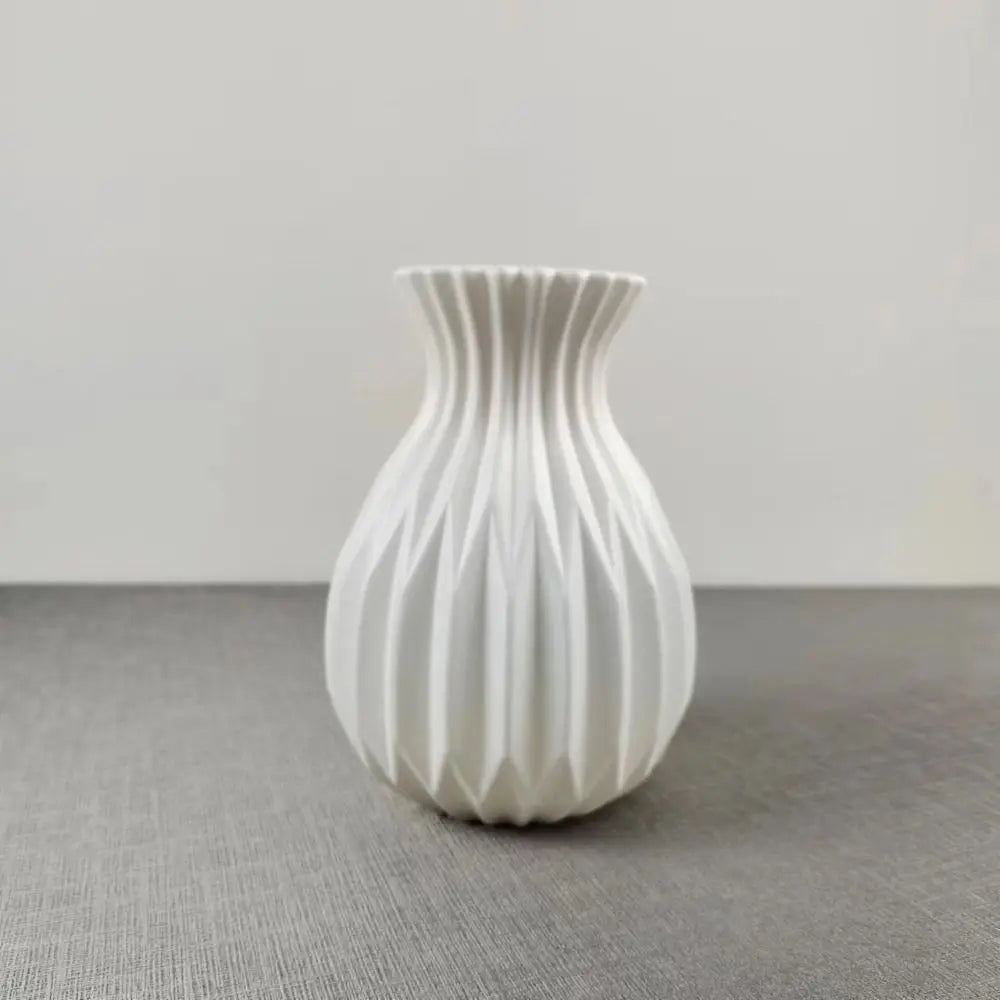 vase moderne fleurs artificielles couleur blanc rouge vert gris noir diagonales opaque