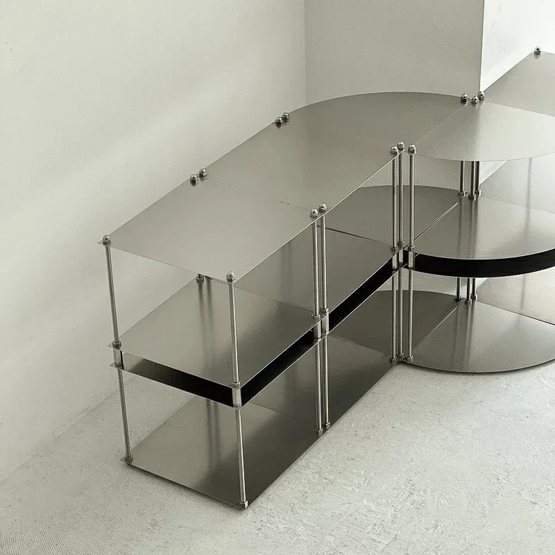 table d'appoint moderne gris métallisé lisse brillante tasse livre vis