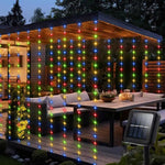 guirlande lumineuse solaire jaune rideau blanc extérieur decoration pergola arbres fleurs
