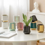 Cache pot céramique moderne blanc doré noir plante verte lisse brillant minimaliste