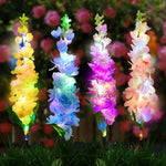 décoration extérieure fleurs lumineuses solaires jaune bleu rose violet piquet métallique moderne festive jardin