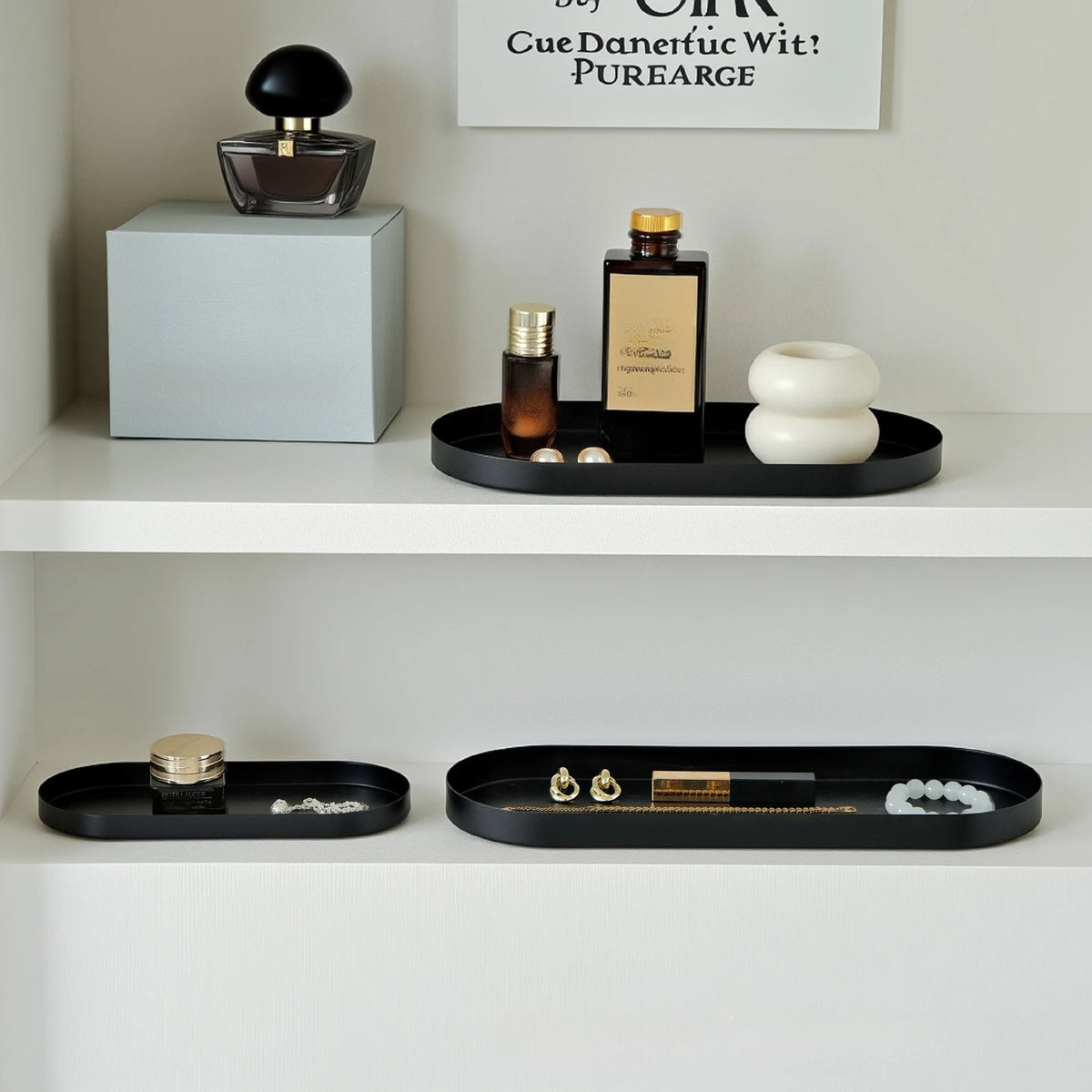 plateau ovale moderne noir mat bijoux parfum flacon lotion bougie calendrier decoration