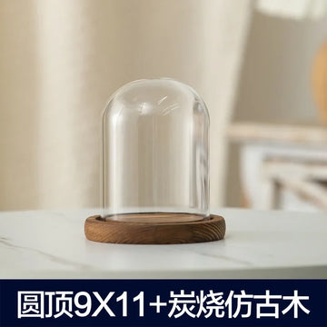 cloche verre transparent base bois bougie parfumée décoration maison moderne