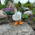 statue résine canard oiseau blanc orange texture rugueuse ailes humoristiques insolites