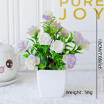 décoration extérieure plante artificielle moderne pot carré blanc branches feuilles vertes fleurs violettes minimalisteextérieur