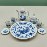 service thé miniature blanc bleu fleurs classique théière crème sucrier tasses assiettes