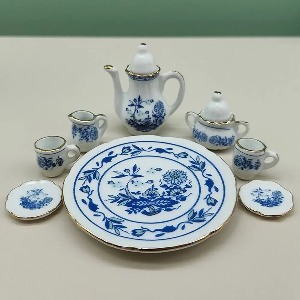 service thé miniature blanc bleu fleurs classique théière crème sucrier tasses assiettes