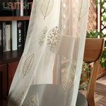 rideau tulle transparent blanc beige motif feuilles stylisées moderne salon chambre fenêtre maison