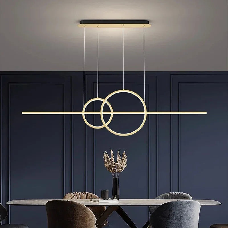 suspension lumineuse moderne or noir minimaliste câbles suspendus panneaux texturés