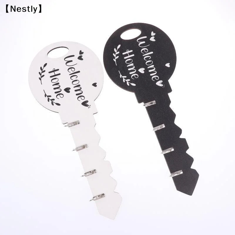 porte clés mural décoration moderne noir blanc welcome crochets métalliques chargeurs usb coeurs feuilles