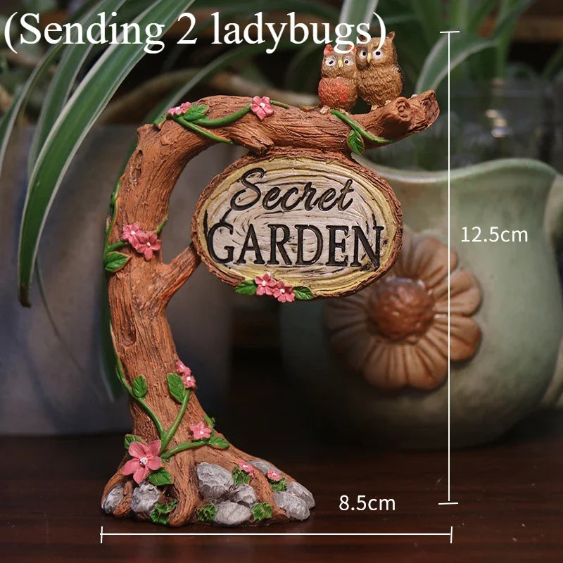 sculpture miniature artisanale arbres feuilles oiseaux balançoire pierres fleurs naturelextérieur jardin decoration résine