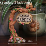 sculpture miniature artisanale arbres feuilles oiseaux balançoire pierres fleurs naturelextérieur jardin decoration résine